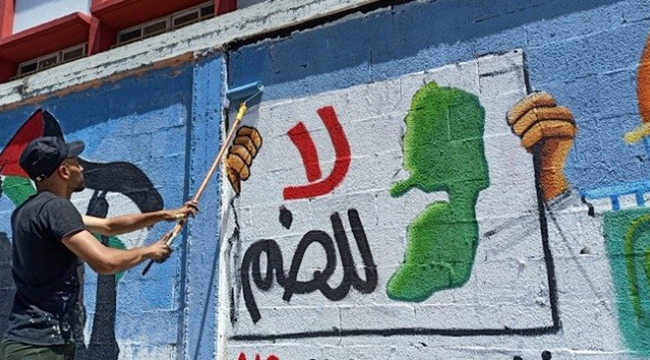 Filistinli gençler, İsrail'in ilhakını grafiti çizerek protesto etti