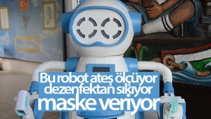 Bu robot ateş ölçüyor, dezenfektan sıkıyor, maske veriyor