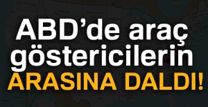 ABD'de araç göstericilerin arasına daldı!