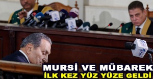 Mursi ve Mübarek mahkemede yüz yüze geldi