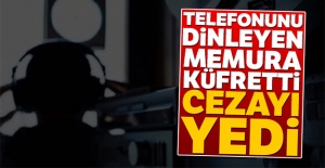 Telefonunu dinleyen memura küfretti, cezayı yedi