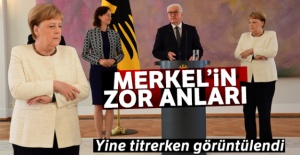 Merkel yine titrerken görüntülendi