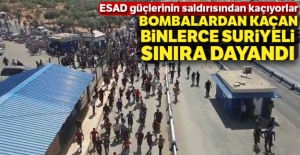 Bombalardan kaçan binlerce Suriyeli sınıra dayandı