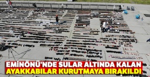 Eminönü'nde sular altında kalan ayakkabılar Yenikapı'da kurutmaya bırakıldı