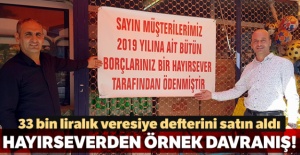 Bakkalın 33 bin liralık veresiye defterini gizli hayırsever satın aldı